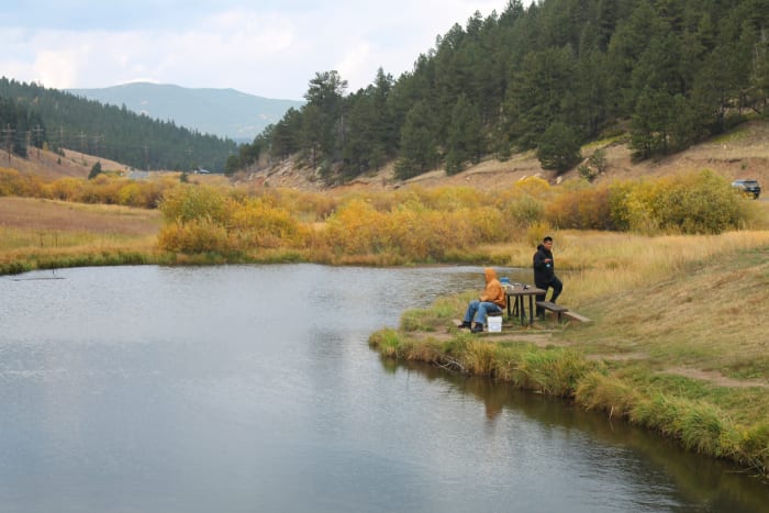 Fellows fishing at Slough Pond near the trail head for Beaver Trail at Golden Gate Canyon State Park.