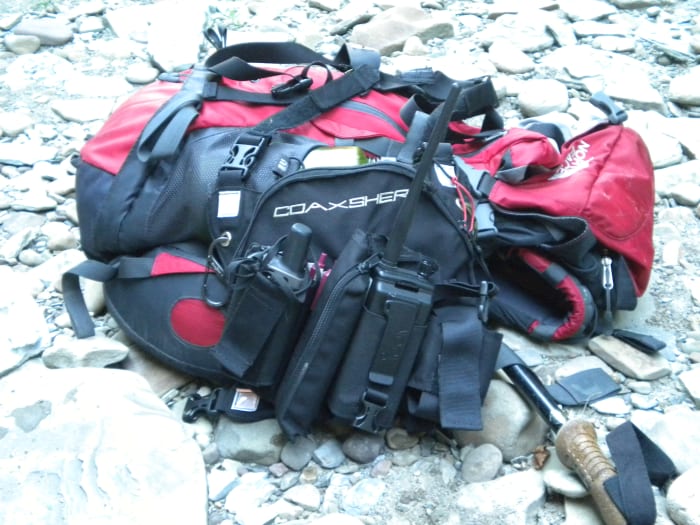The North Face Terra 35 is a nice size for a SAR 24-hour pack. The Coaxsher radio harness is a necessity.