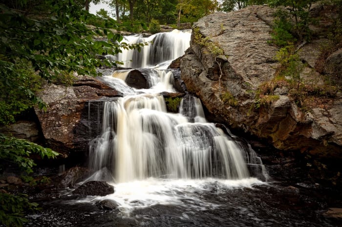 Even a lovely waterfall like this can be a host to contamination. Purifying water before consumption can save your life.
