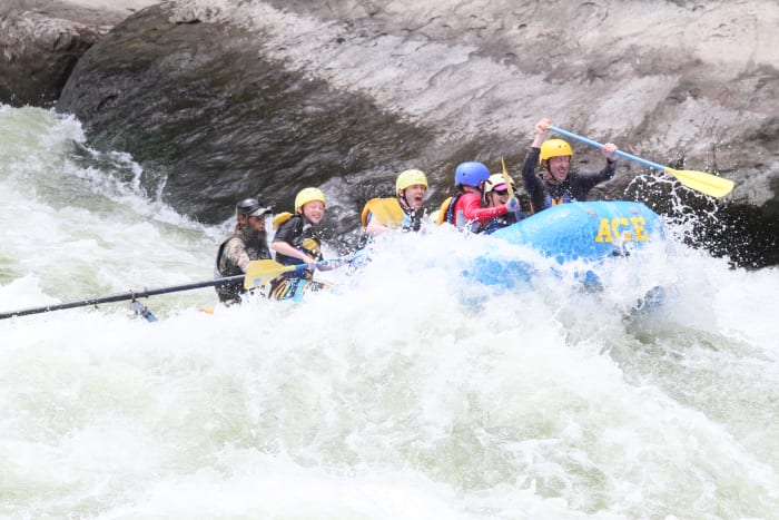 Oars and an expert guide stabilize a raft in Class V white water, allowing kids as young as 9 years of age to experience the thrill of this extreme sport.