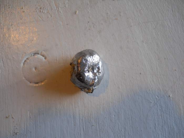 180 grain Winchester Power Point used in previous .300 WSM test and recovered from green pine round. Fired at 10 yards, bullet shows textbook expansion and retained 90% of its weight.