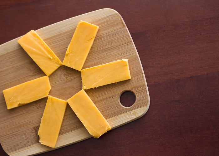 Substitute two ounces cheddar cheese for one cup of cottage cheese. If you don't want cheddar cheese, you can have two eggs or two ounces of ham.