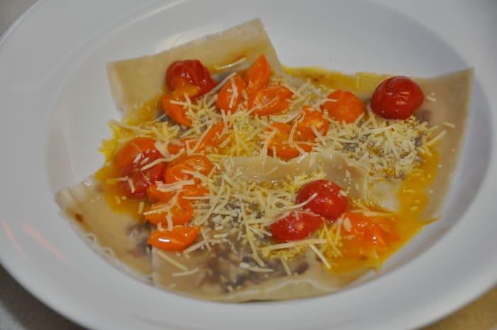 Wonton ravioli with seared red and yellow cherry tomatoes, which are a great source of lycopene