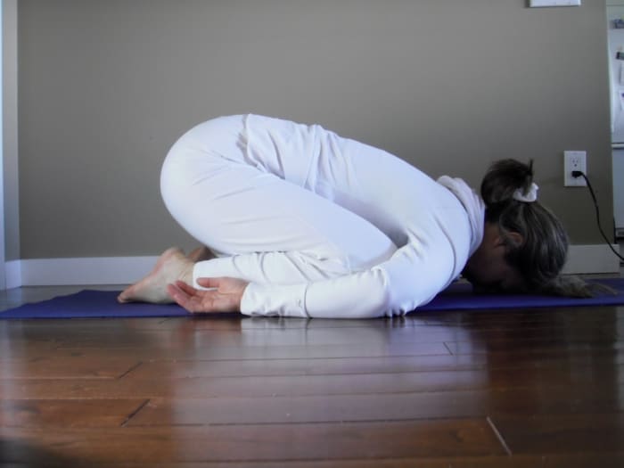 Keep the toes together and bring the knees apart to make room for your baby and room to breathe.