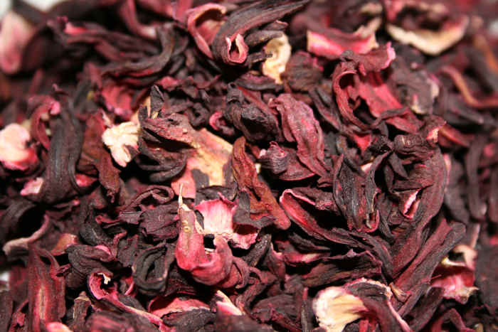 Hibiscus sabdariffa flowers after being dried out, and ready to make tea.