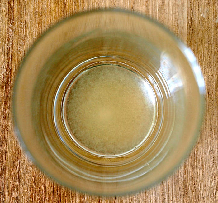 The first step for creating Master Cleanse Lemonade is to squeeze fresh lemons—store-bought lemon juice will taste much more acidic.
