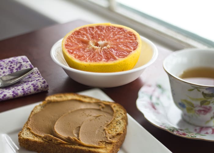 Breakfast: 1/2 a grapefruit, toast with peanut butter, and black coffee (I added skim milk to mine).