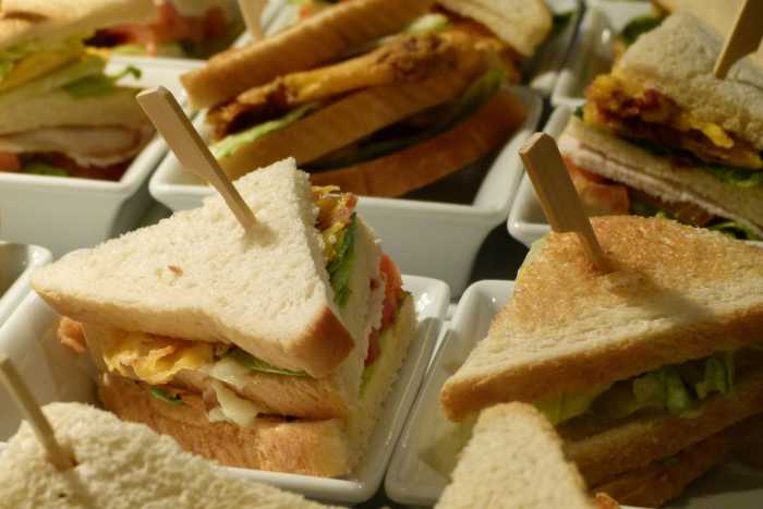The turkey meat in your club sandwich is a great source of tryptophan which can help boost your mood and put a smile on your face.