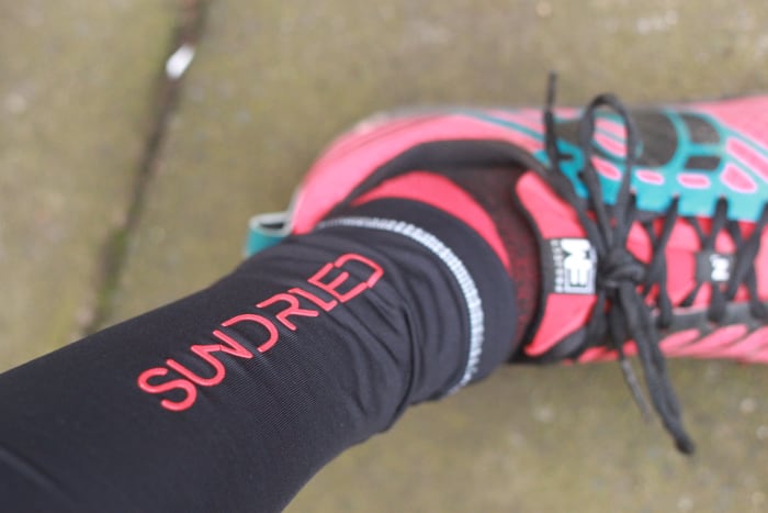 Reflective banding around the ankle of the Sundried Leggings and Pearl Izumi's great Trail m1 running shoes