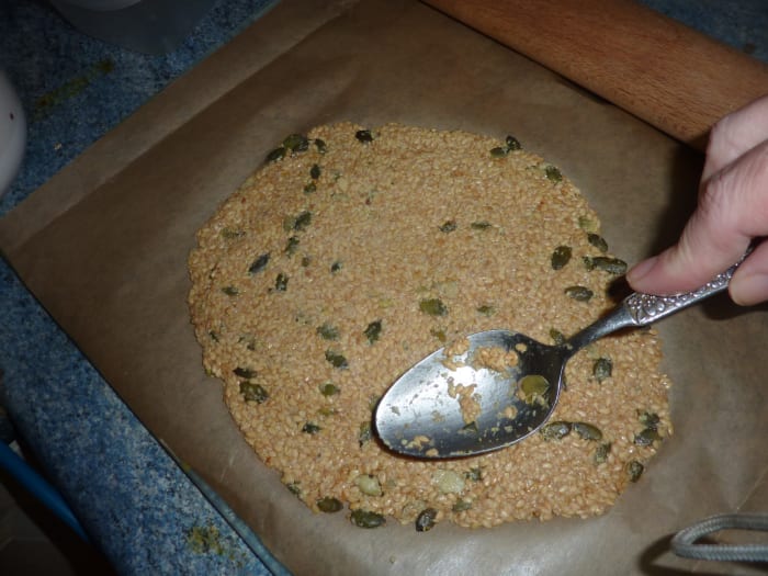 However carefully you roll, it will go out of shape, so reshape with a tablespoon.