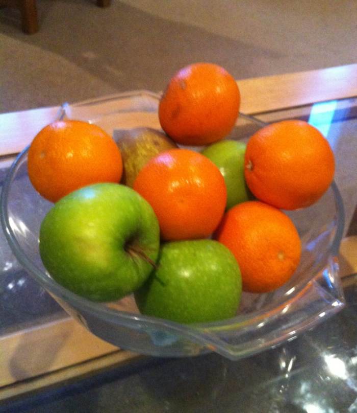 Even when trying to lose weight, if you're hungry, you should eat. The trick is to choose a healthy snack such as fresh fruit or a handful of nuts rather than cake, a candy bar, or chips