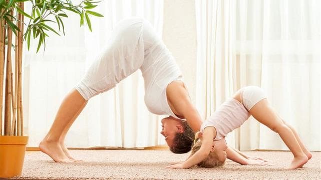Your kids will love to practice yoga along side you. This is an excellent opportunity to start your child on a life-long healthy habit.