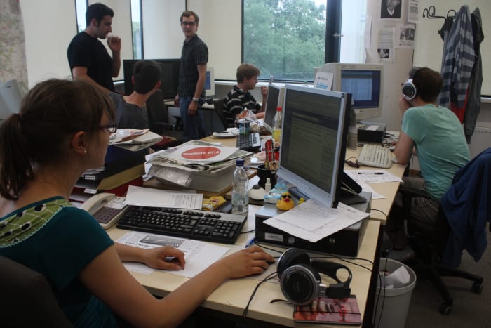 Newsrooms are cluttered and busy, and can be noisy, loud, and hectic.