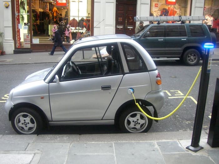 This electric car in London is getting a recharge. In a world without oil, cars like these will become more common.