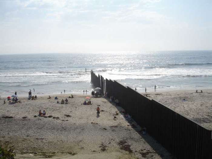The beach at Tijuana viewed from the Mexican side of the border. The Pacific Ocean can be seen as well as the barrier that marks the border. Amnesty critics often argue that more preventative means need to be in place to stop illegal immigration.