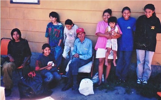9 of 14 grandchildren living with 89 year old grandfather, parent dead or drunk, no heat, no water, two room house