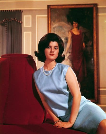 Luci Johnson During the White House Years. Portrait in background is First Lady Grace Coolidge.