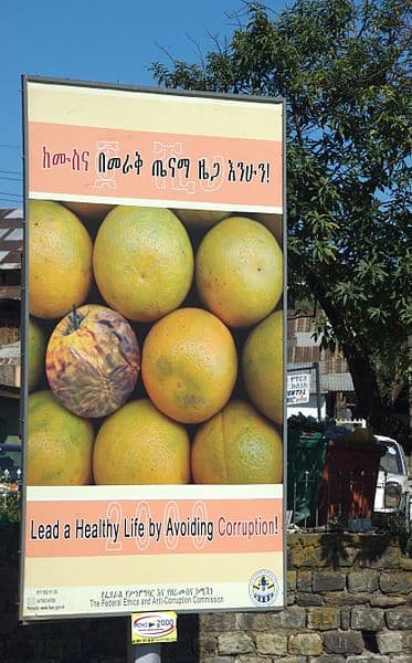 Anti-corruption PSA in Ethiopia. "One Rotten Grapefruit . . . (2141752816)" by A. Davey from Where I Live Now: Pacific Northwest - One Rotten Grapefruit . . .Uploaded by Elitre. Licensed under Creative Commons Attribution 2.0