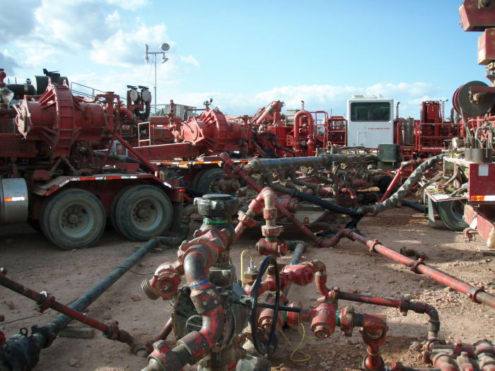Halliburton fracking operation in the Bakken Formation, North Dakota, USA. Anti-frackers argue that the industry is disruptive and harmful to the areas that they work in. In some circumstances, the process can even cause earthquakes, they argue.