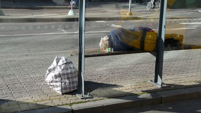 Sleeping on benches and keeping a public routine may indicate homelessness or simply a lack of good transportation options.