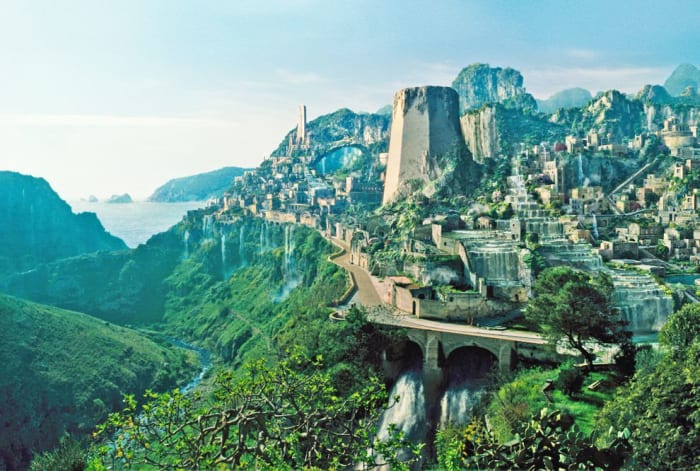 The fictional island of Themycira, home of the Amazons, could arguably be seen as a representation of Diana's worldviews: sheltered, innocent, unchallenged, and unaware of anything else. It contrasts the setting of World War I.