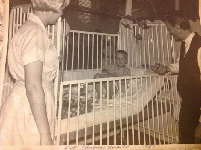 Me having surgery at five years old. They still had me in a crib, not because I needed one but so they could tie me to the bed at night. The would tie the opposing arm and leg so I wouldn't roll over on the catheter in my sleep.