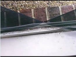 Police opined that Darlie sliced this screen with a bread knife from her kitchen to support her story of an intruder