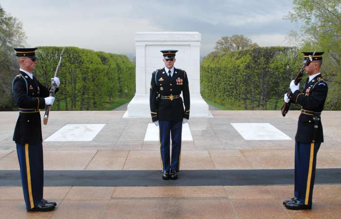 The Changing of the Guard at the Tomb of the Unknowns is an event that is distinctly patriotic. It symbolizes respect and gratitude for those that have made great sacrifices for America. Few people would confuse it with nationalism or fascism.