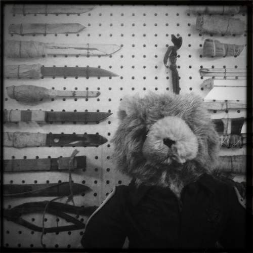 Homemade knifes (shanks) taken from inmates at Folsom Prison along with the official prison teddy bear.