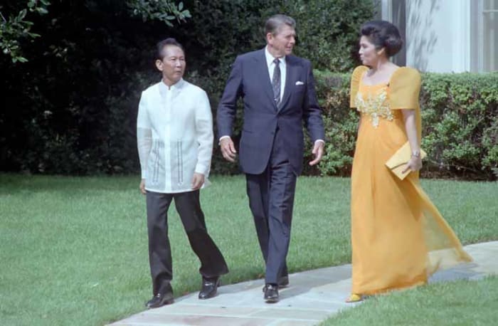 Ferdinand Marcos (left) and Imelda Marcos (right) with U.S. President Ronald Reagan.