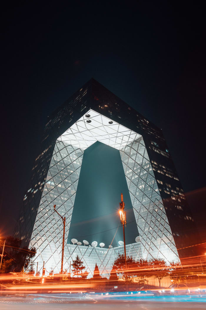 Famous "Pant Leg Building." Beijing is a modern city which attracts hundreds of thousands of rural people looking for financial opportunities.