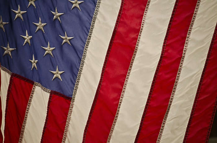 A classical liberal is in favor of a free, open society. This is different from the liberal/conservative paradigm present in American politics today, where both parties are 'liberal' in the classical sense.