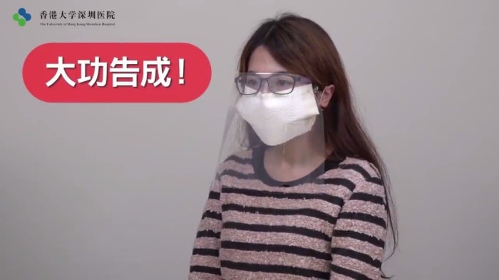 The image is from the instructional video released by the university hospital. The legend in Chinese reads ”大功告成“ which dictionaries translate as successful completion, or a task that has been accomplished.