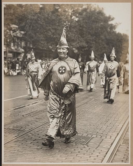 Grand Wizard Dr. Hiram Evans of Alabama leads fellow Klansmen in a march through Washington, D.C. in 1926.