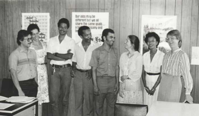 This photograph was taken by a client named George. I am standing on the far right wearing glasses. The three on the left were my field officers. The Executive Director is next to them.
