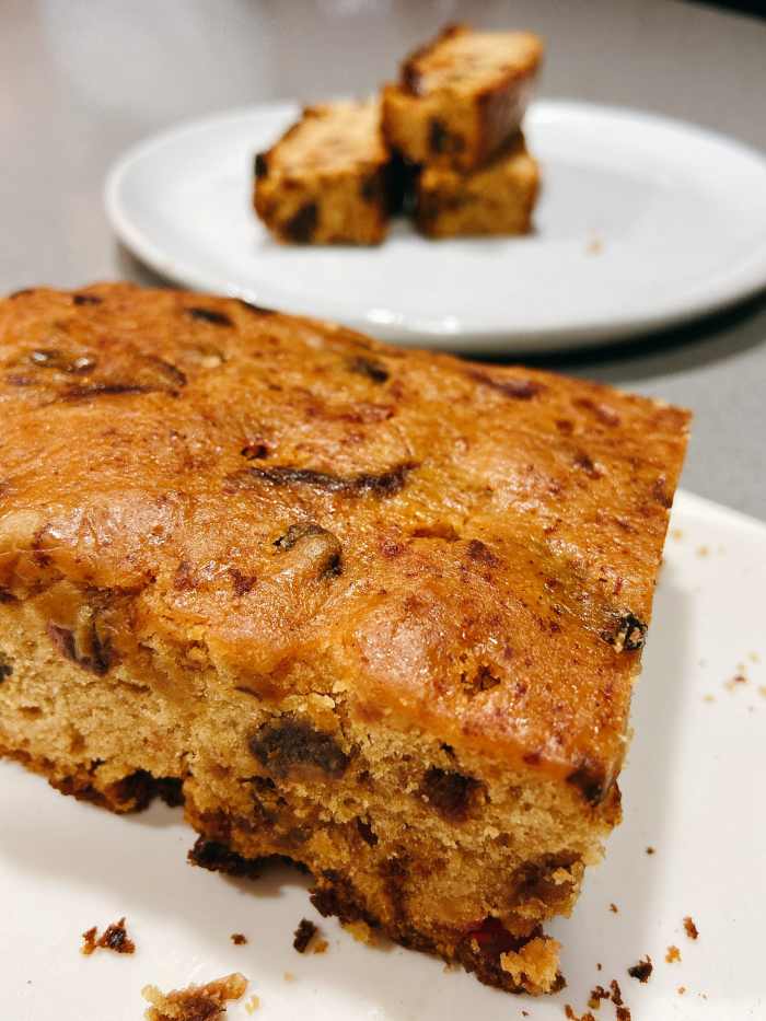 On Christmas morning, my husband and I enjoyed a few slices of fruitcake while watching the snow outside the window.