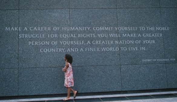 A young girl takes in the message at the Martin Luther King, Jr. National Memorial in Washington, DC.