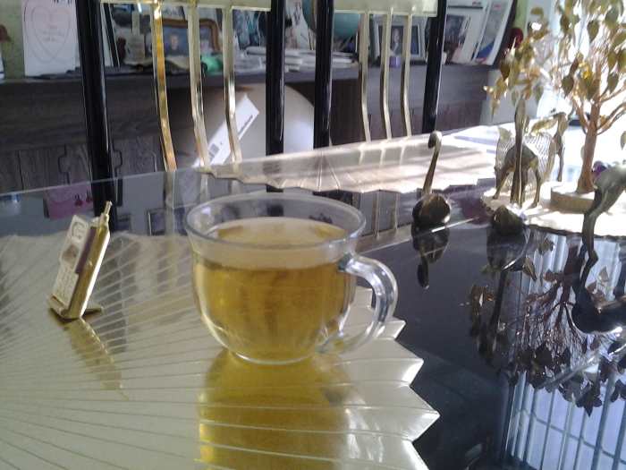 A cup of Sage tea I had a couple of nights ago. 1 Tbs. of rubbed sage leaves steeped in a cup of hot water.