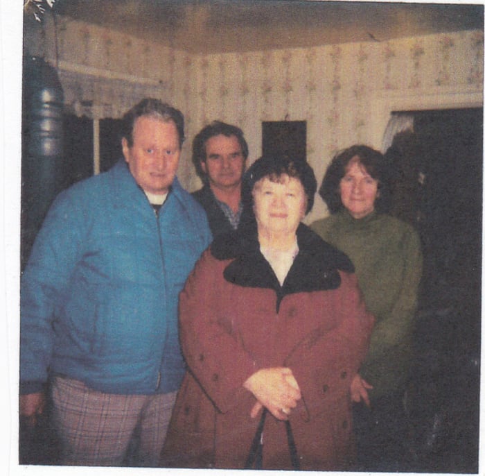 Standing in front left to right: uncle Augie and his second wife Sylvia. Standing in back are my father and mother. Picture taken about 1985.