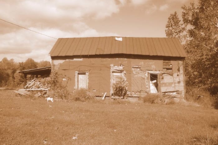 This old place is located next to my childhood home. It has been unoccupied since the early 1970s.