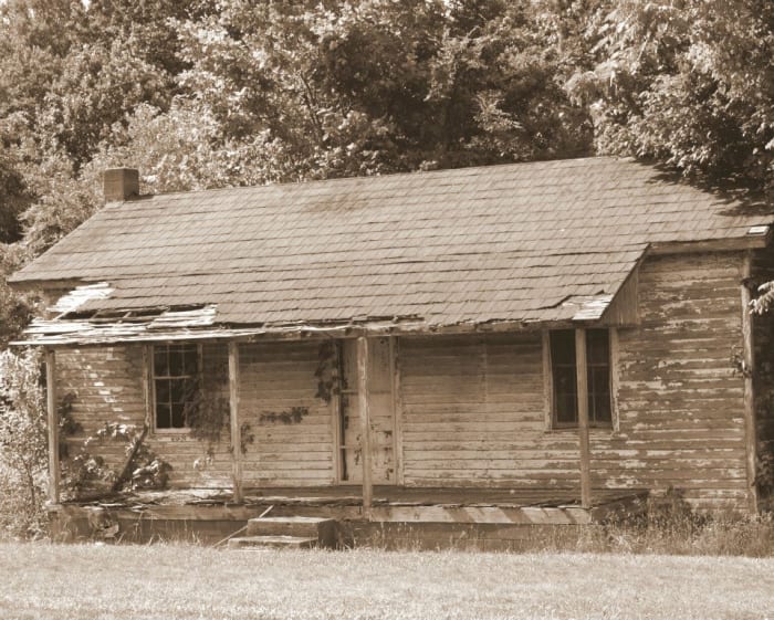 This is the house that inspired this poem. It is located next to my old elementary school, and I remember when it was lived in.