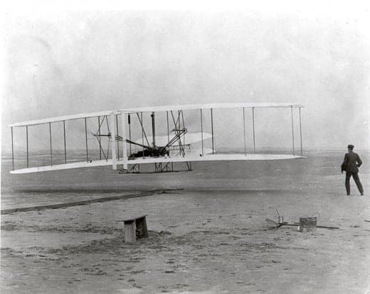 Wright Brothers and early airplane Source: By Attributed to Wilbur Wright (1867–1912) and/or Orville Wright (1871–1948). Orville Wright preset the camera and had John T. Daniels squeeze the rub
