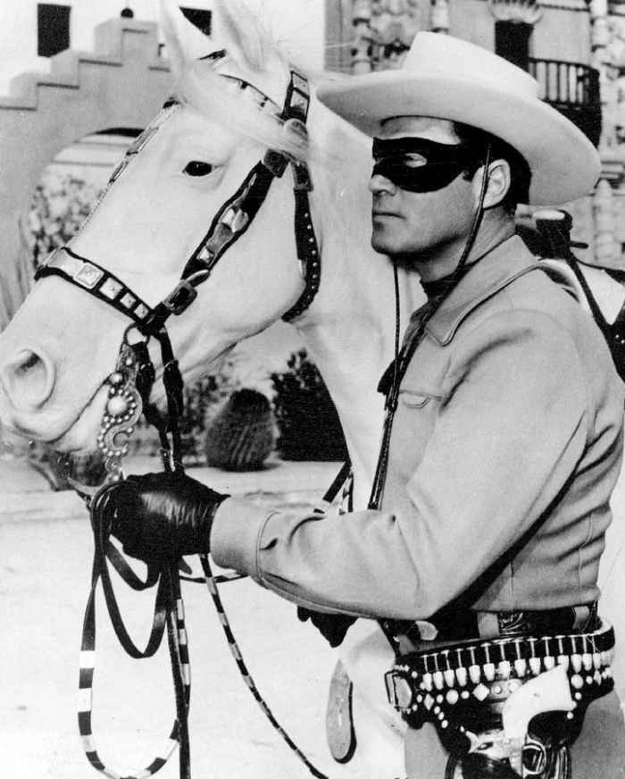 Publicity photo of Clayton Moore as the Lone Ranger and his horse Silver