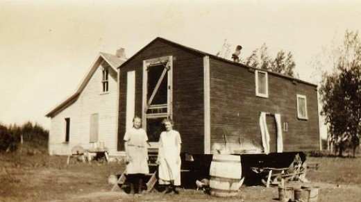 The women would prepare meals and the food would be transported to the men in the field during threshing time. This building called a "cook house" was on wheels and the horses would pull it.