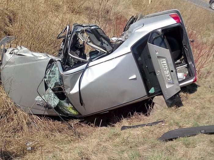 My parents, thrown from their car, lay helplessly on the ground unable to move their broken bodies.