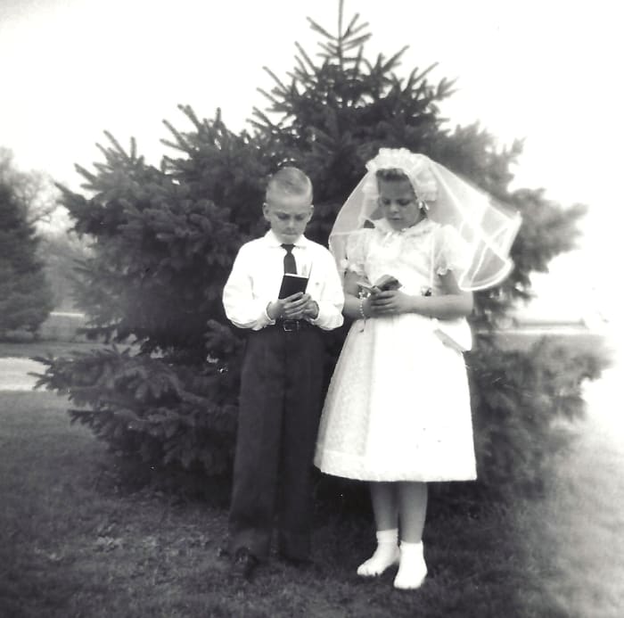 My cousin had his first Holy Communion at the same time as mine. Here we are looking very serious and prayerful for the photo taken in our yard in Oconomowoc. May, 1956.