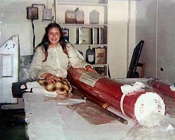 This was me aged 11, pictured at the rock factory where my mum worked, with the "biggest stick of rock in the world". I'm wearing my mum's platform shoes, a fake fur bomber jacket and a mini-kilt, fashionable at the time, although cringe-worthy now!