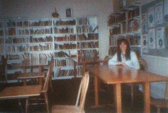 Me sitting in the library of my former school, 20 years after leaving, just before it was closed down to convert it into flats.
