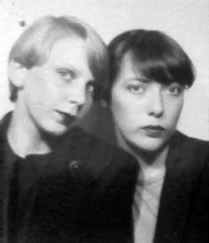 Pictured on the right, with a schoolfriend, I was in the fourth form when I had my long hair cut off. I had the sides of my hair cropped very short, but the top left longer.