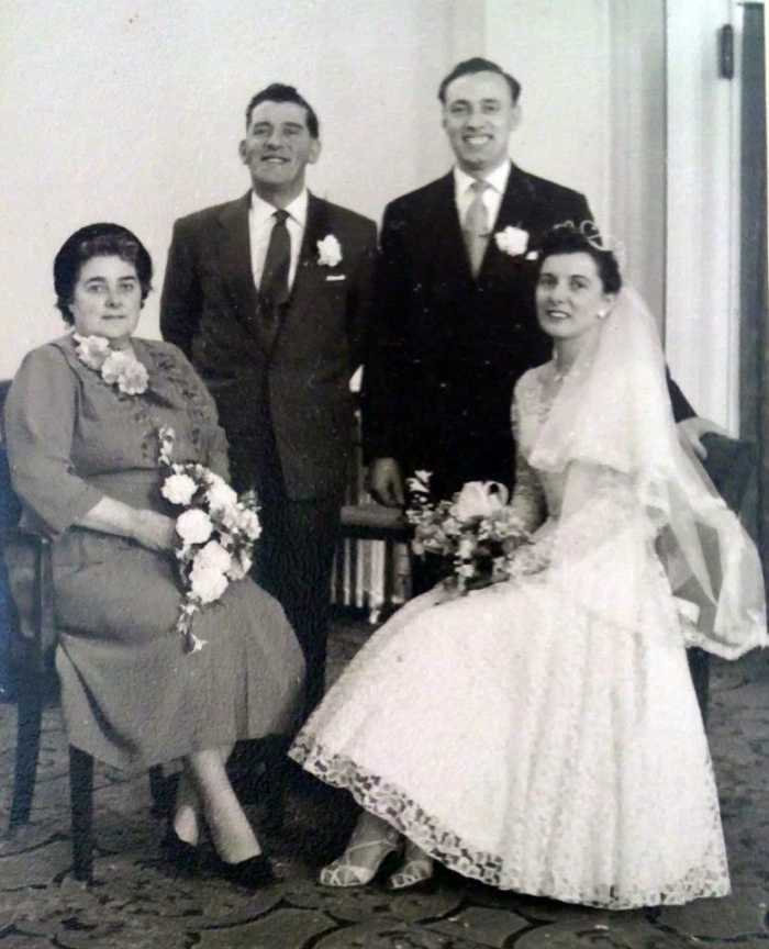 Mum and dad's wedding day: The happy couple are pictured with mum's parents, grandma Ivy and grandad Frank Trigg.